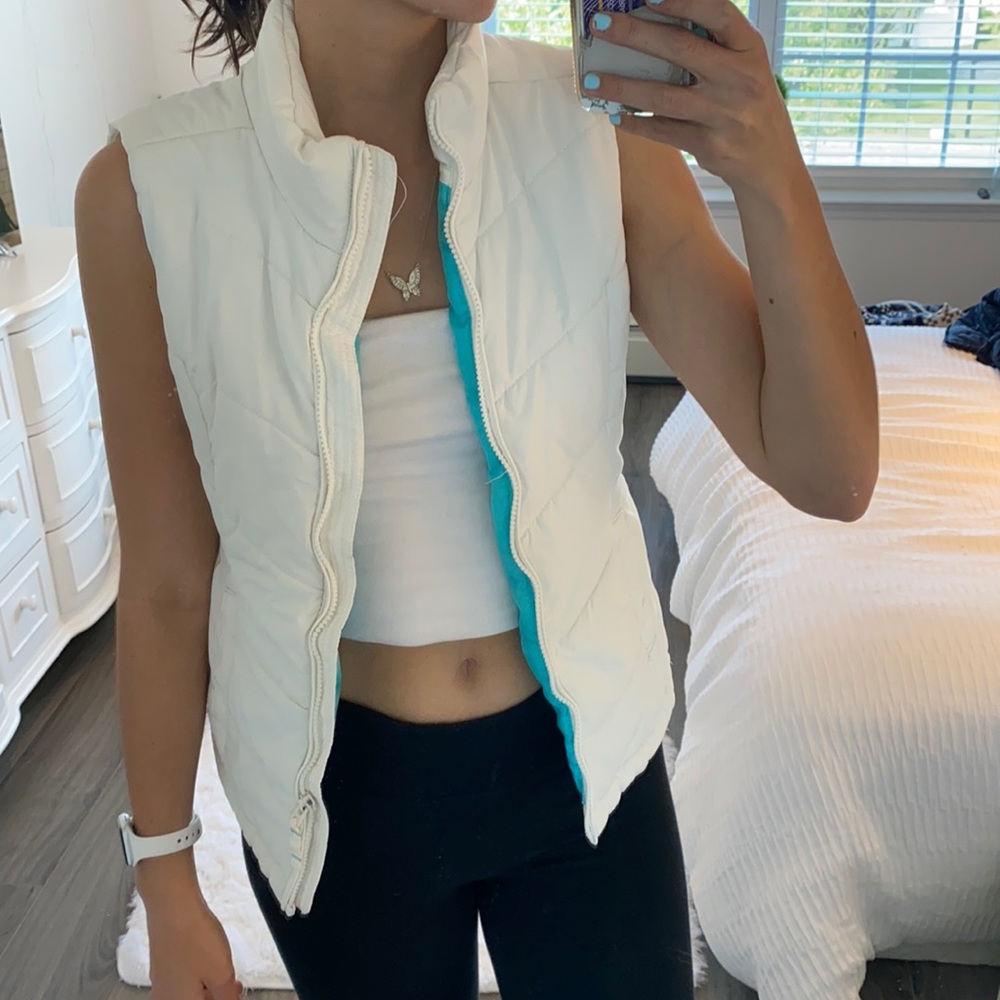 White puffy vest